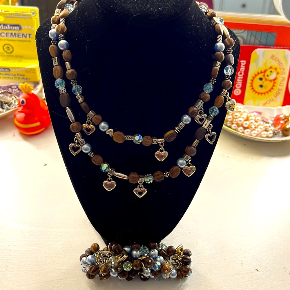 Brighton retired necklace and bracelet with a tin or bag.